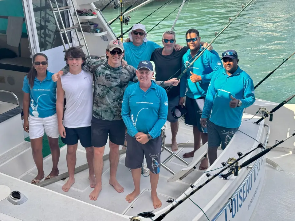 Crew and guests aboard L’Oiseau Des Iles II in Rodrigues after a record-breaking season
